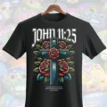 John 11:25 cross with roses DTF shirt design on black t-shirt