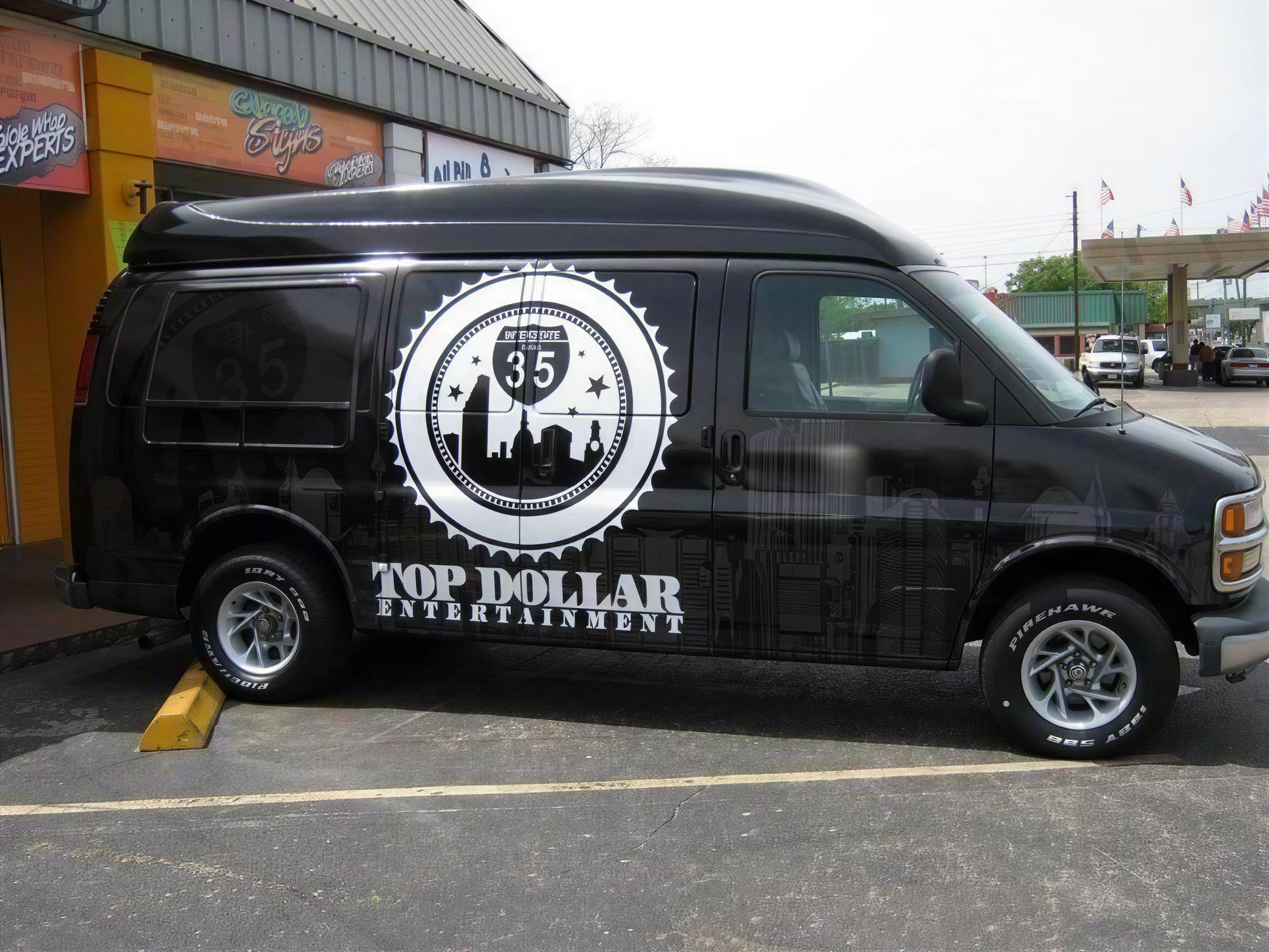 partial vehicle wraps Austin Top Dollar Entertainment van with custom vinyl side graphics