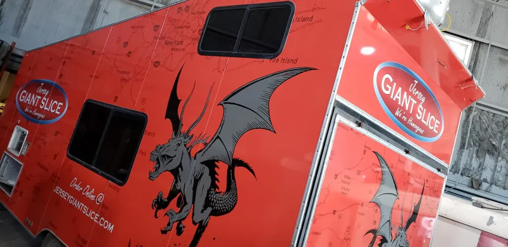 Commercial trailer with custom vehicle wraps Austin TX featuring Giant Slice branding and full vehicle graphics