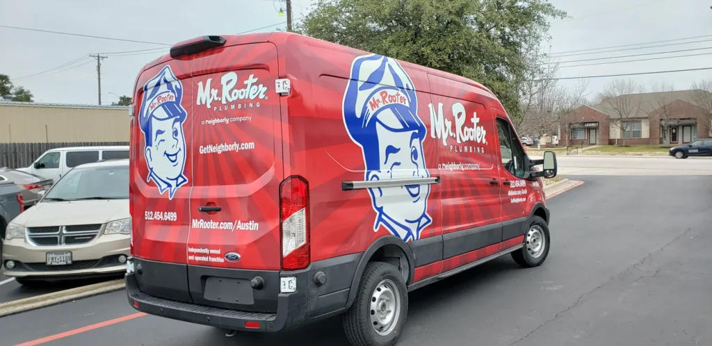 Mr Rooter Plumbing van with custom vehicle wraps Austin and commercial vehicle graphics
