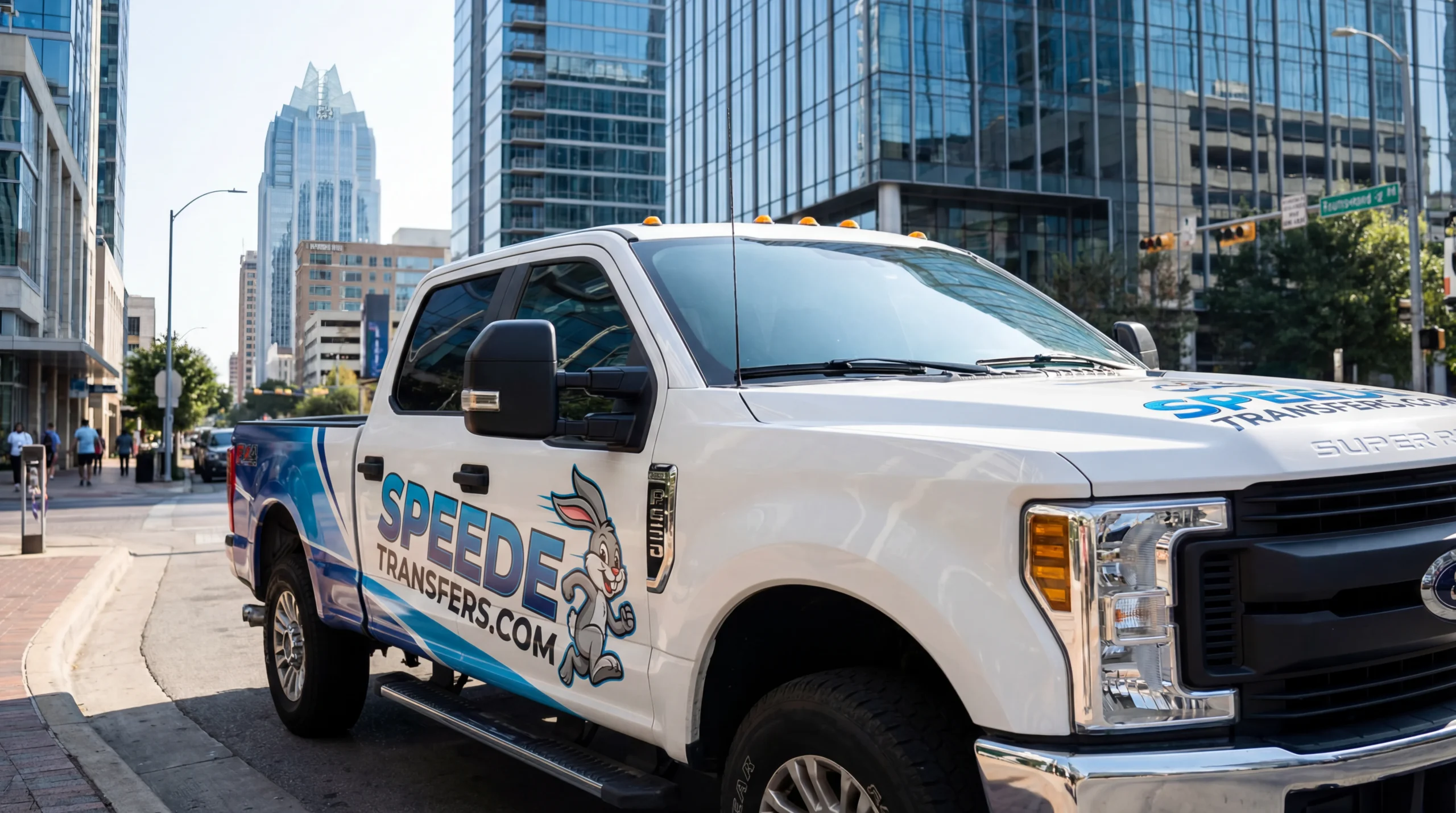 Commercial vehicle wrap installation process showing SpeedETransfers technician applying vinyl wrap to company van in Austin Texas