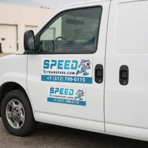 Vehicle magnets on white work van door showing 18x24 and 12x24 removable advertising signs
