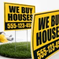 Custom 18x24 bandit signs printed on white coroplast with optional metal step stakes for outdoor advertising